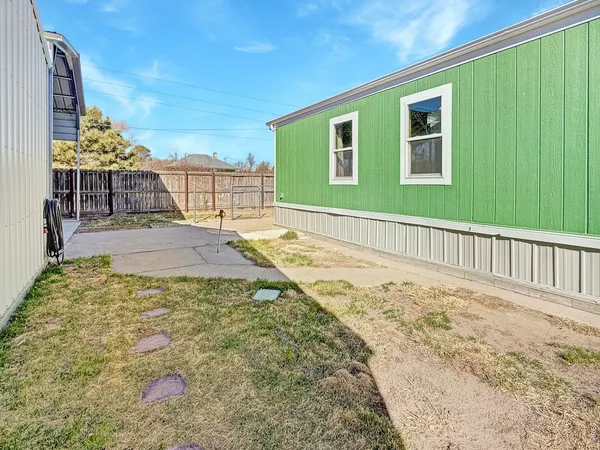 a view of a swimming pool with a lounge chairs