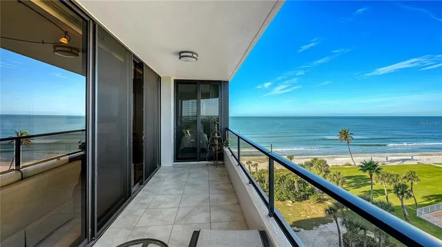 a view of balcony with ocean view