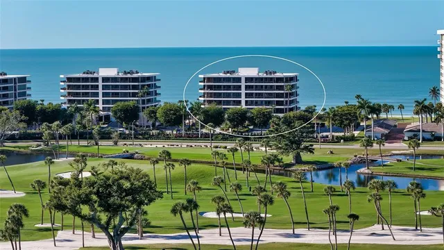 a view of a swimming pool with a lounge chairs