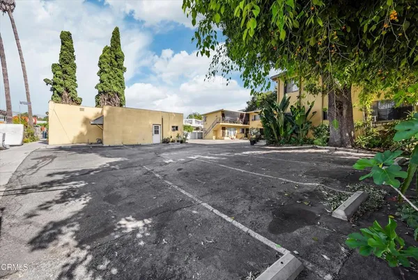 a view of a backyard of a house