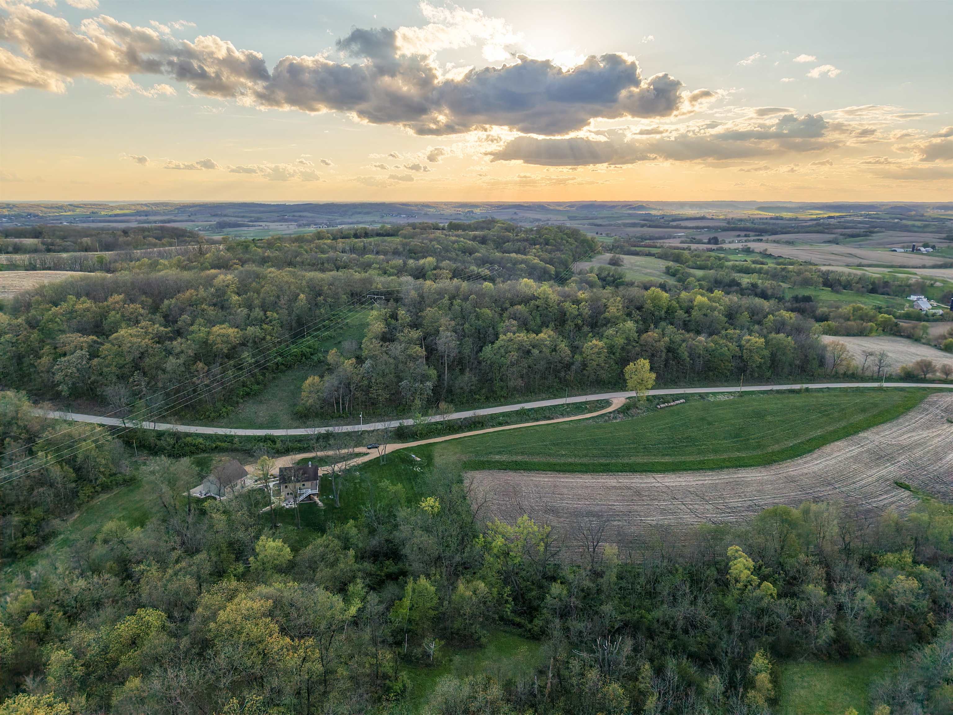 5829 South Pleasant Hill Road Elizabeth, IL 61028 - Photo 32 of 68 an aerial view of field with trees around
