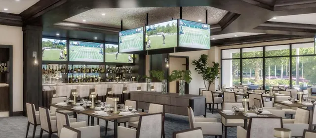 a room with lots of white furniture and windows