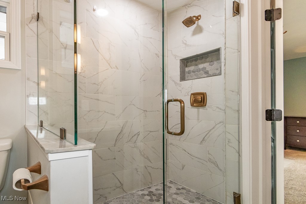 38856 Johnnycake Ridge Road Willoughby, OH 44094 - Photo 35 of 49 Bathroom with toilet and a shower with door