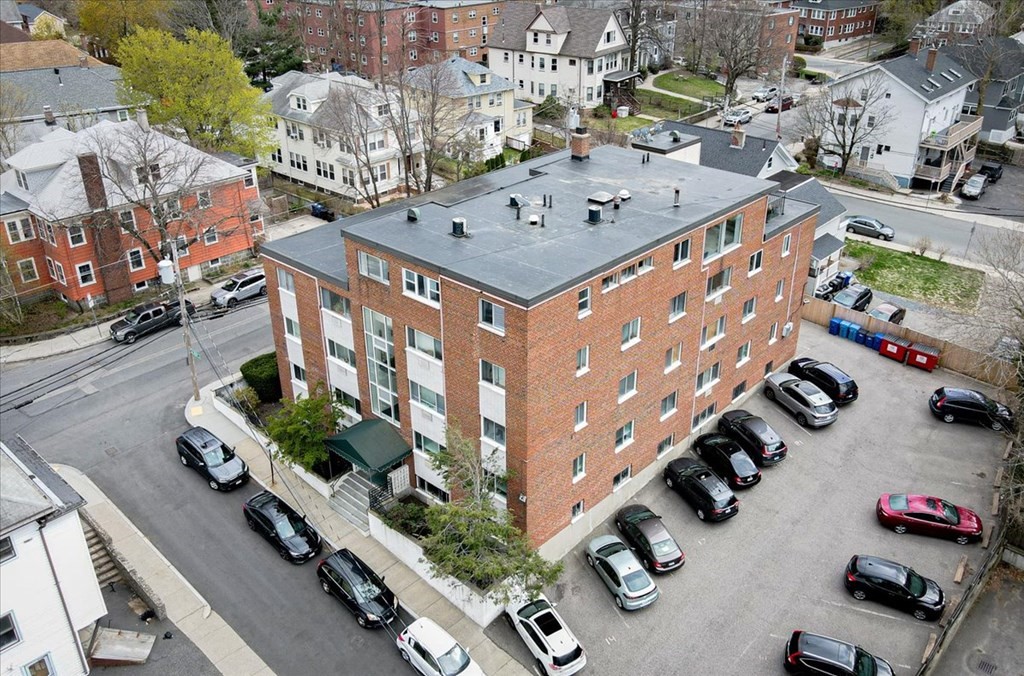 2 Larose Place, Unit 8 Boston, MA 02135 - Photo 14 of 19 an aerial view of residential houses with outdoor space
