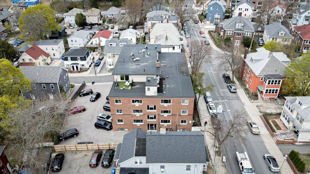 2 Larose Place, Unit 8 Boston, MA 02135 - Photo 18 of 19 an aerial view of residential houses with outdoor space