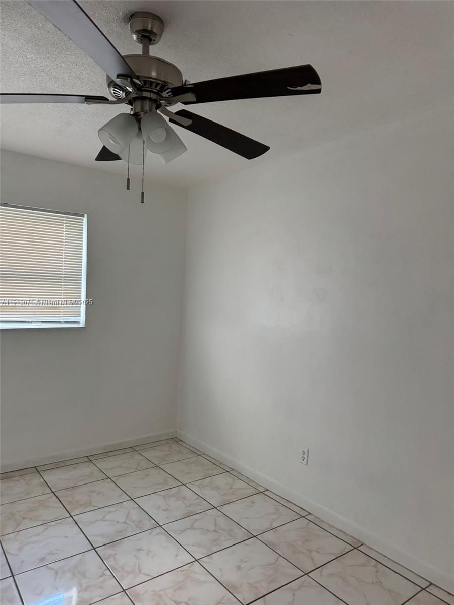 50 West 23rd Street, Unit 15 Hialeah, FL 33010 - Photo 14 of 19 a view of a small space