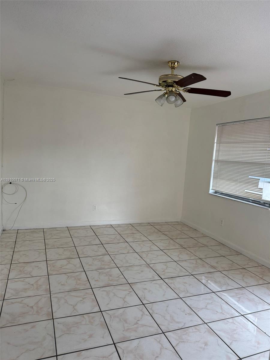 50 West 23rd Street, Unit 15 Hialeah, FL 33010 - Photo 5 of 19 a view of an empty room