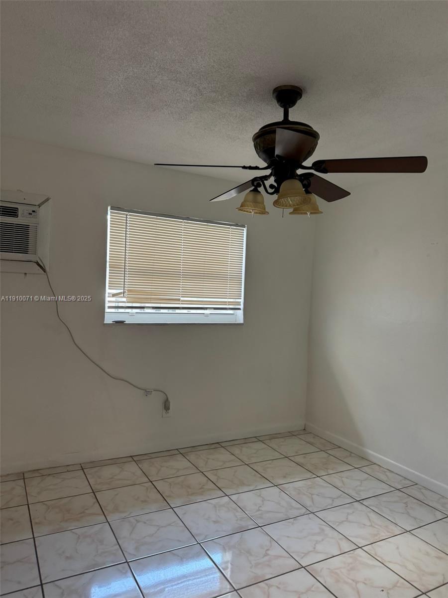 50 West 23rd Street, Unit 15 Hialeah, FL 33010 - Photo 10 of 19 a view of room with a window
