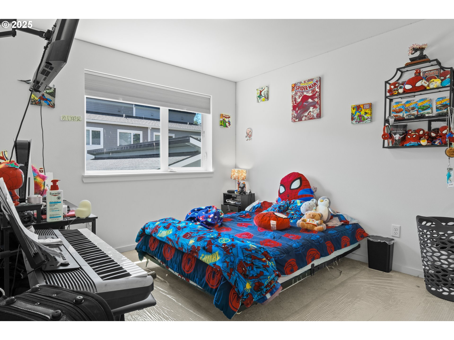13425 Southeast Foster Road, Unit 40 Portland, OR 97236 - Photo 7 of 14 a bedroom with toys and a wooden floor