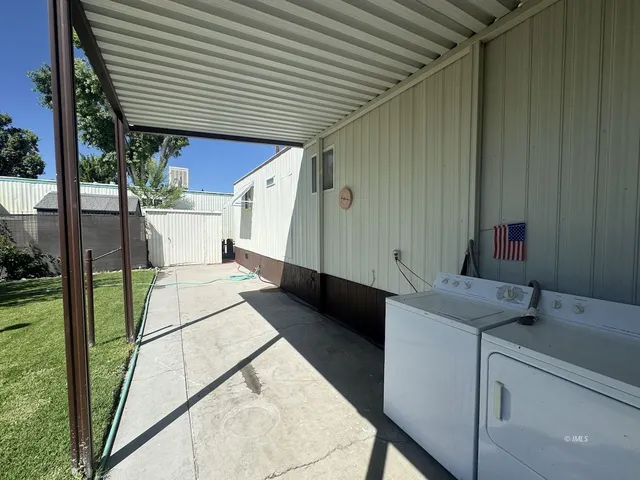 a house view with a backyard space