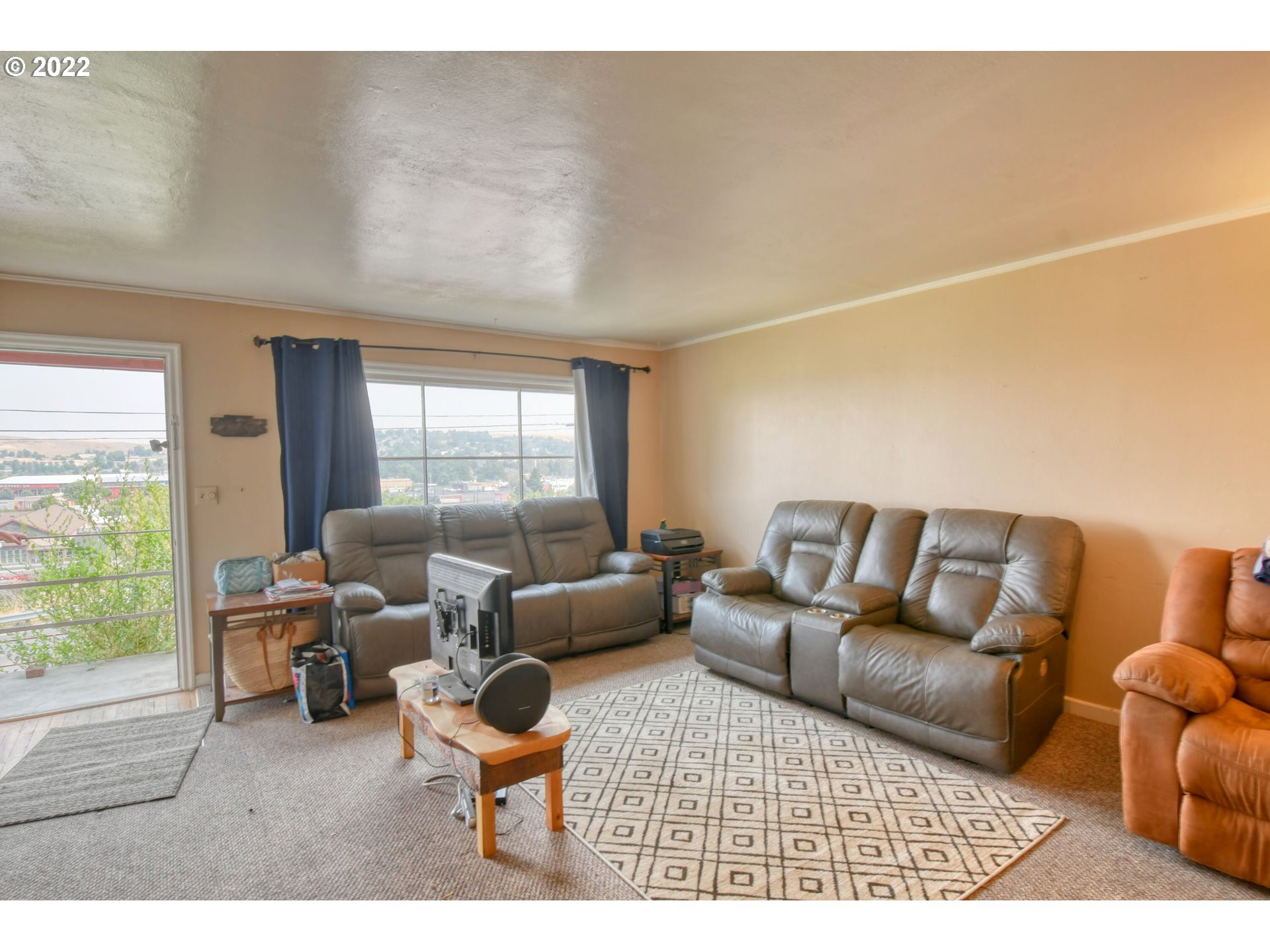 1302 Southwest Goodwin Lane Pendleton, OR 97801 - Photo 13 of 21 a living room with furniture and a large window