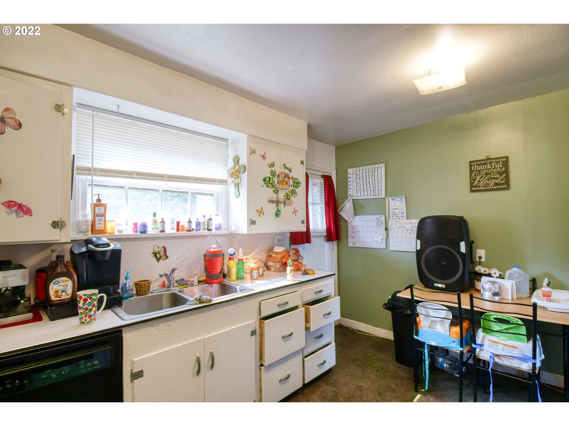 1302 Southwest Goodwin Lane Pendleton, OR 97801 - Photo 9 of 21 a kitchen with a sink cabinets and appliances