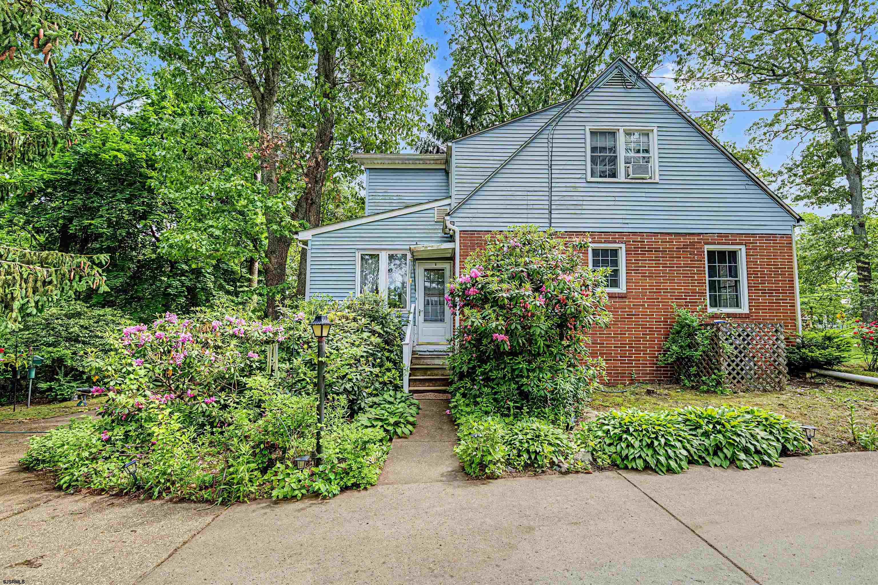 144 Pitney Road Absecon, NJ 08201 - Photo 42 of 47 front view of a house with a yard