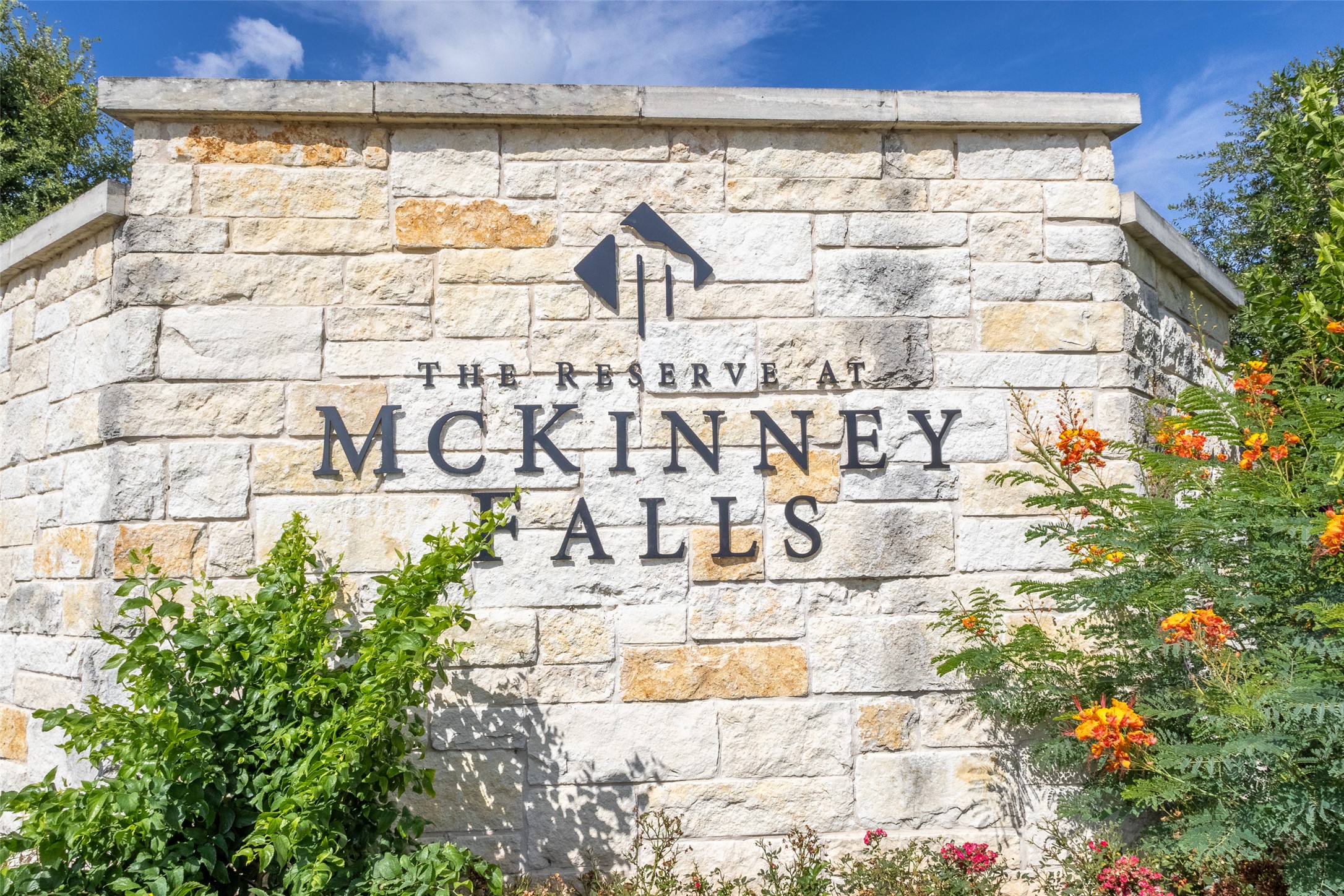 7225 Ranchito Drive Austin, TX 78744 - Photo 38 of 39 Discover this well-maintained stone entrance to The Reserve at McKinney Falls.