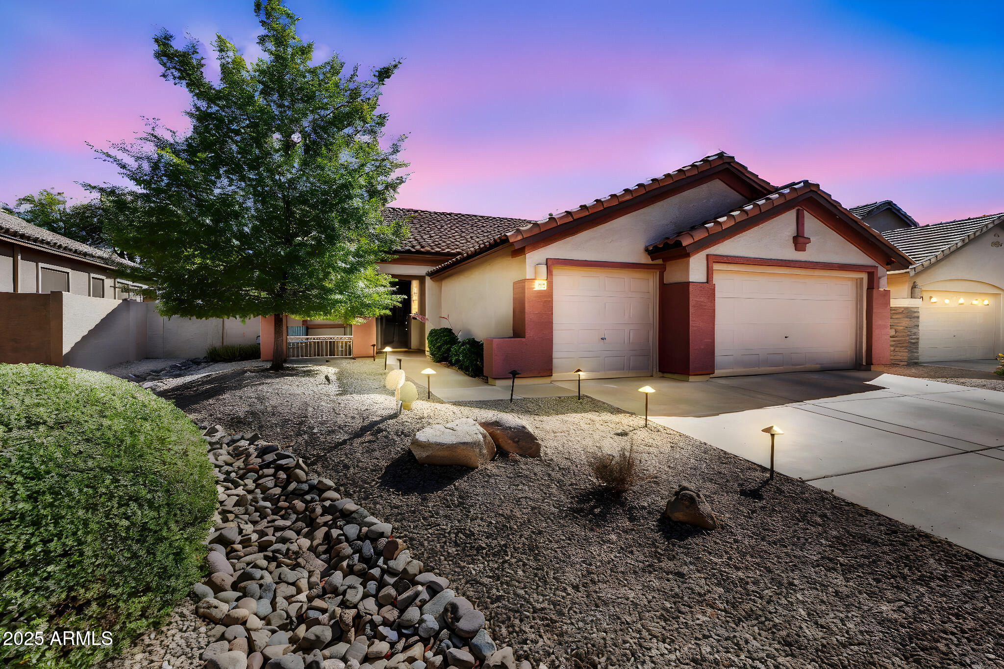 4821 East Kirkland Road Phoenix, AZ 85054 - Photo 2 of 22 a front view of a house with a yard