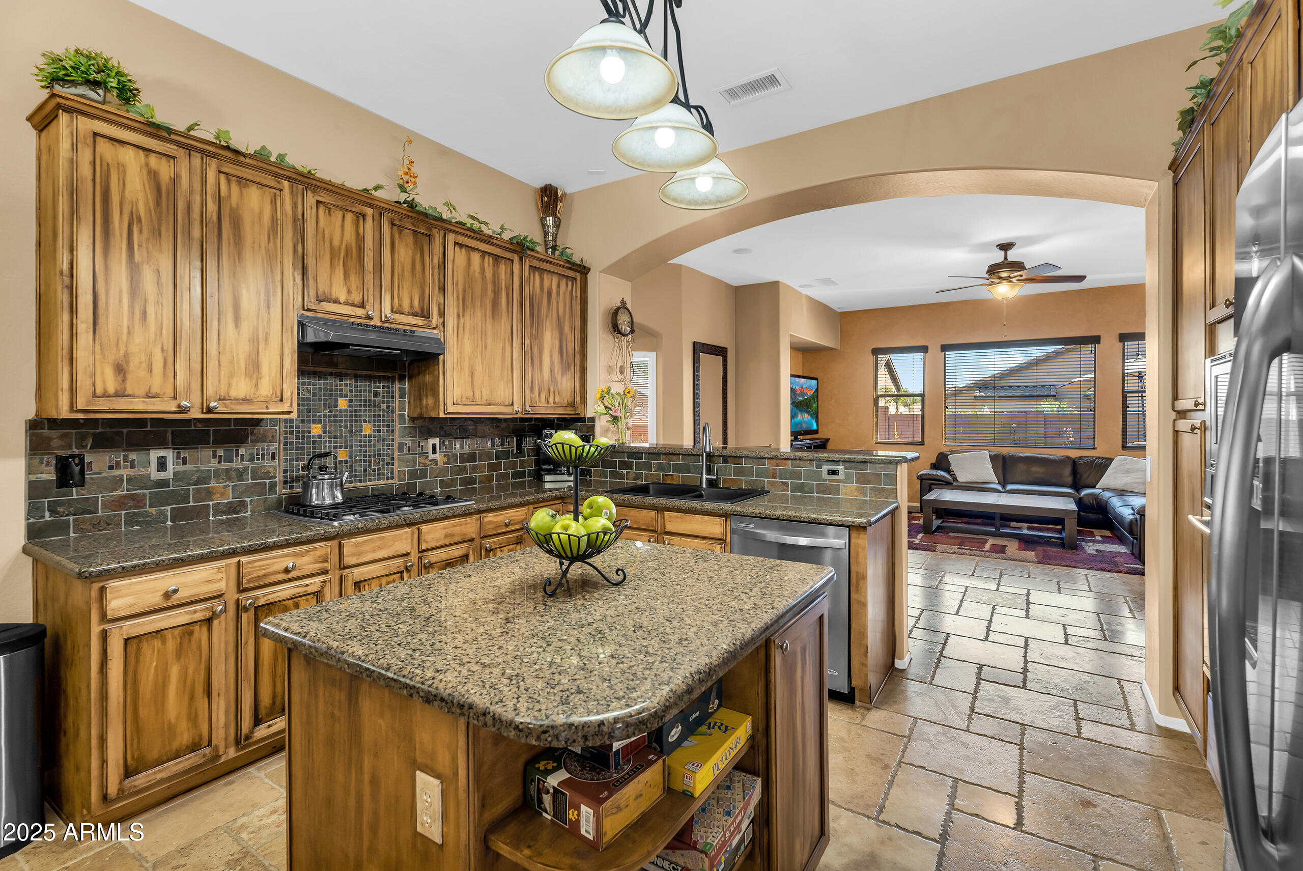 4821 East Kirkland Road Phoenix, AZ 85054 - Photo 4 of 22 a kitchen with a sink a stove and cabinets