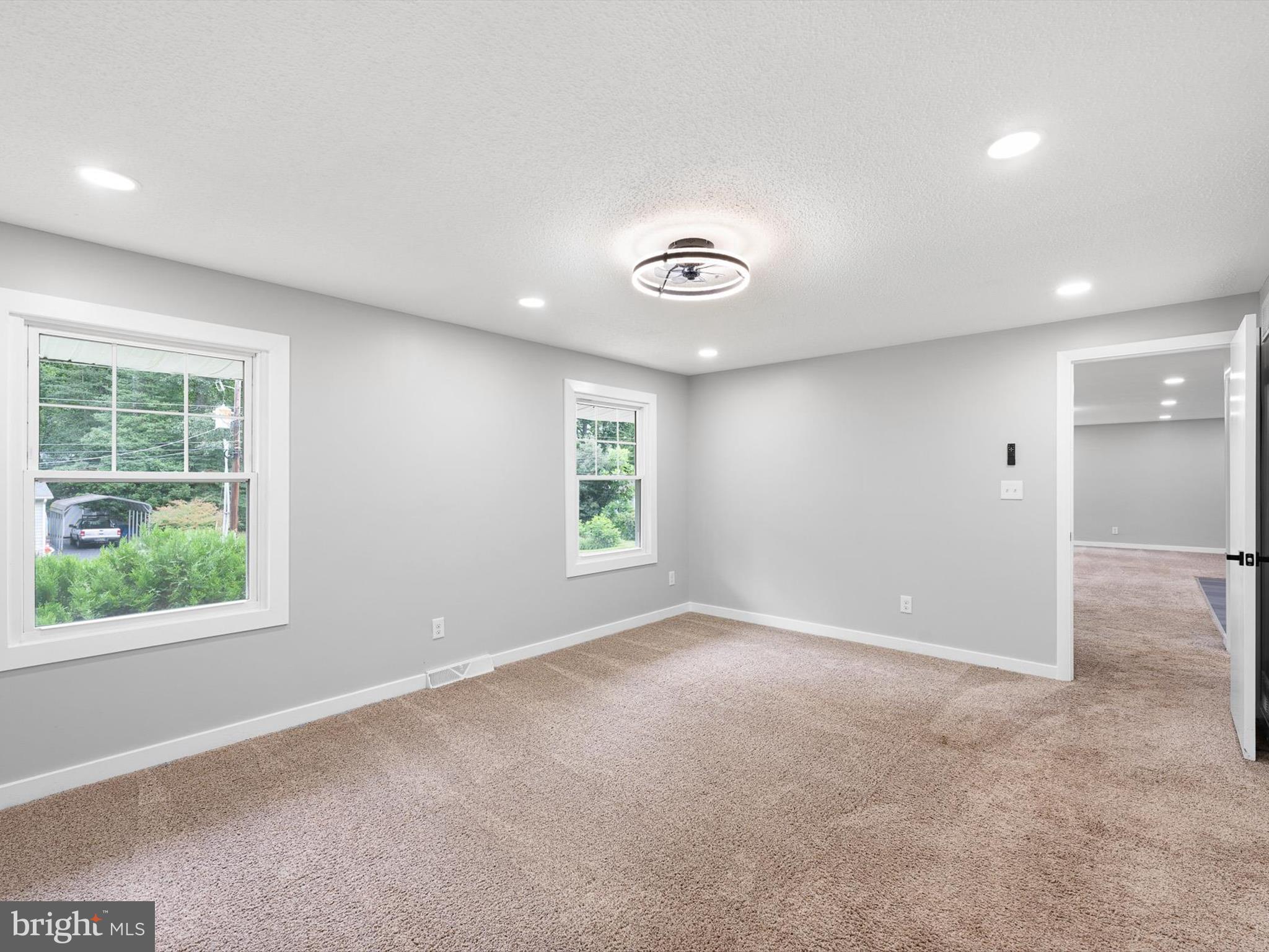 22832 Angola Road East Lewes, DE 19958 - Photo 22 of 43 an empty room with windows