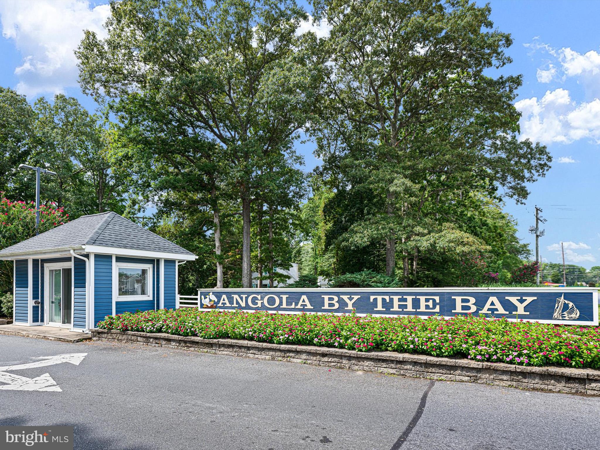 22832 Angola Road East Lewes, DE 19958 - Photo 41 of 43 a front view of a house with a garden