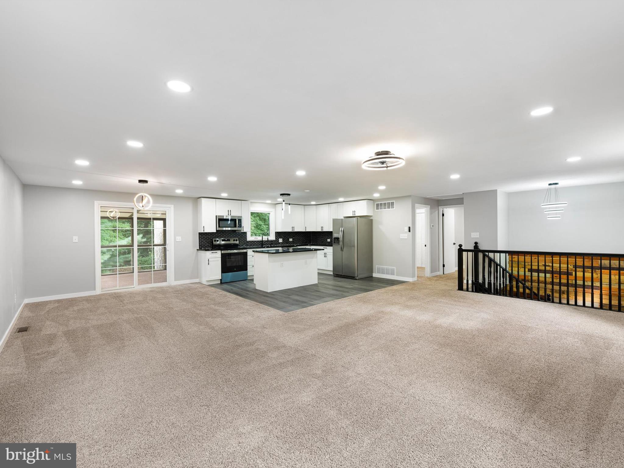 22832 Angola Road East Lewes, DE 19958 - Photo 5 of 43 a view of large kitchen with a sink and a large window