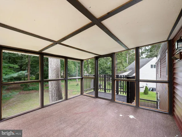a view of an entryway with a garden