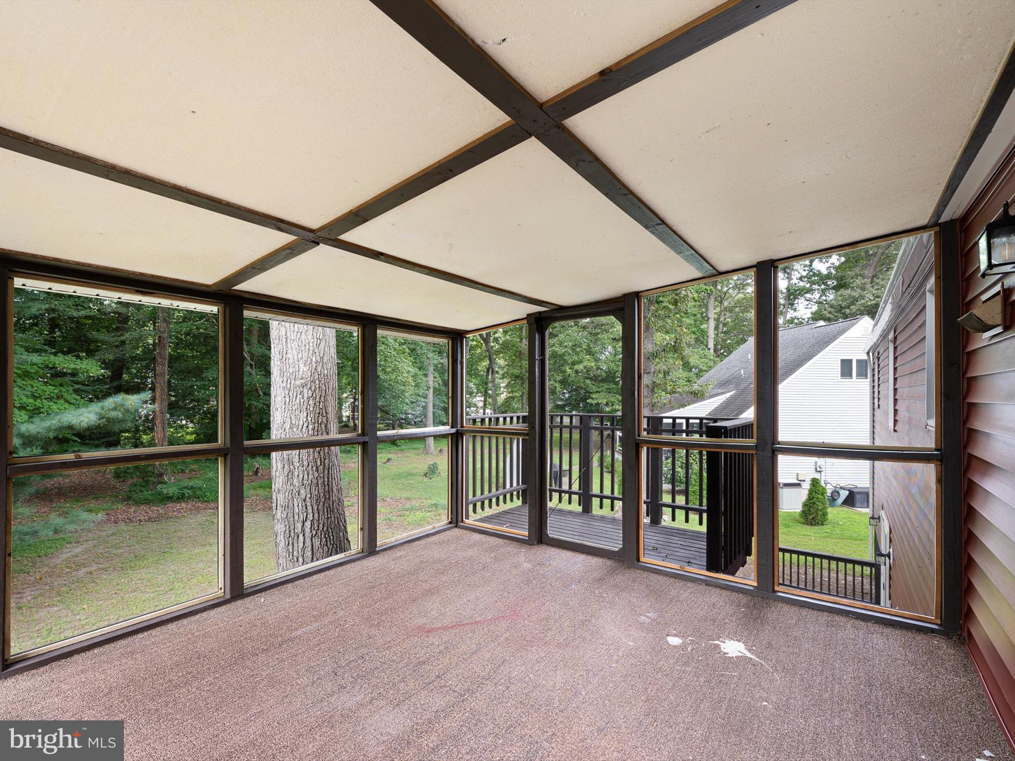 22832 Angola Road East Lewes, DE 19958 - Photo 7 of 43 a view of an entryway with a garden