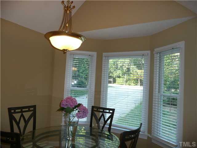 6705 Glendower Road Raleigh, NC 27613 - Photo 12 of 16 inviting dining room with bay window