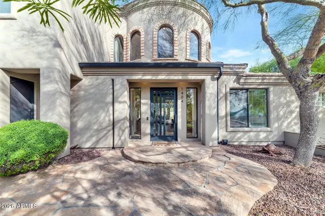 a view of entrance gate of a house