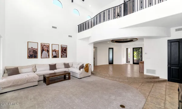 a view of livingroom with furniture and windows