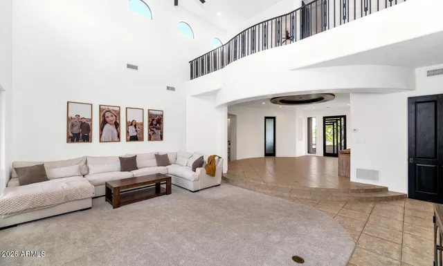 a view of livingroom with furniture and windows