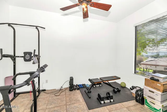 a work room with table and chairs