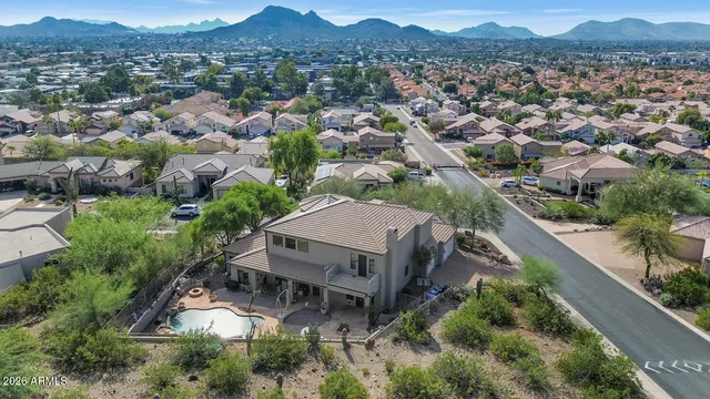 an aerial view of a house with a garden