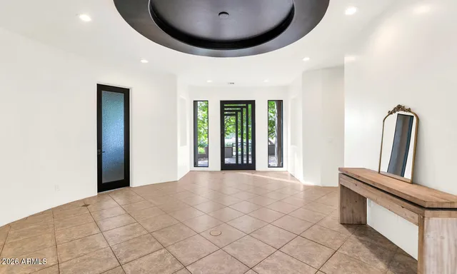 a view of an empty room and window