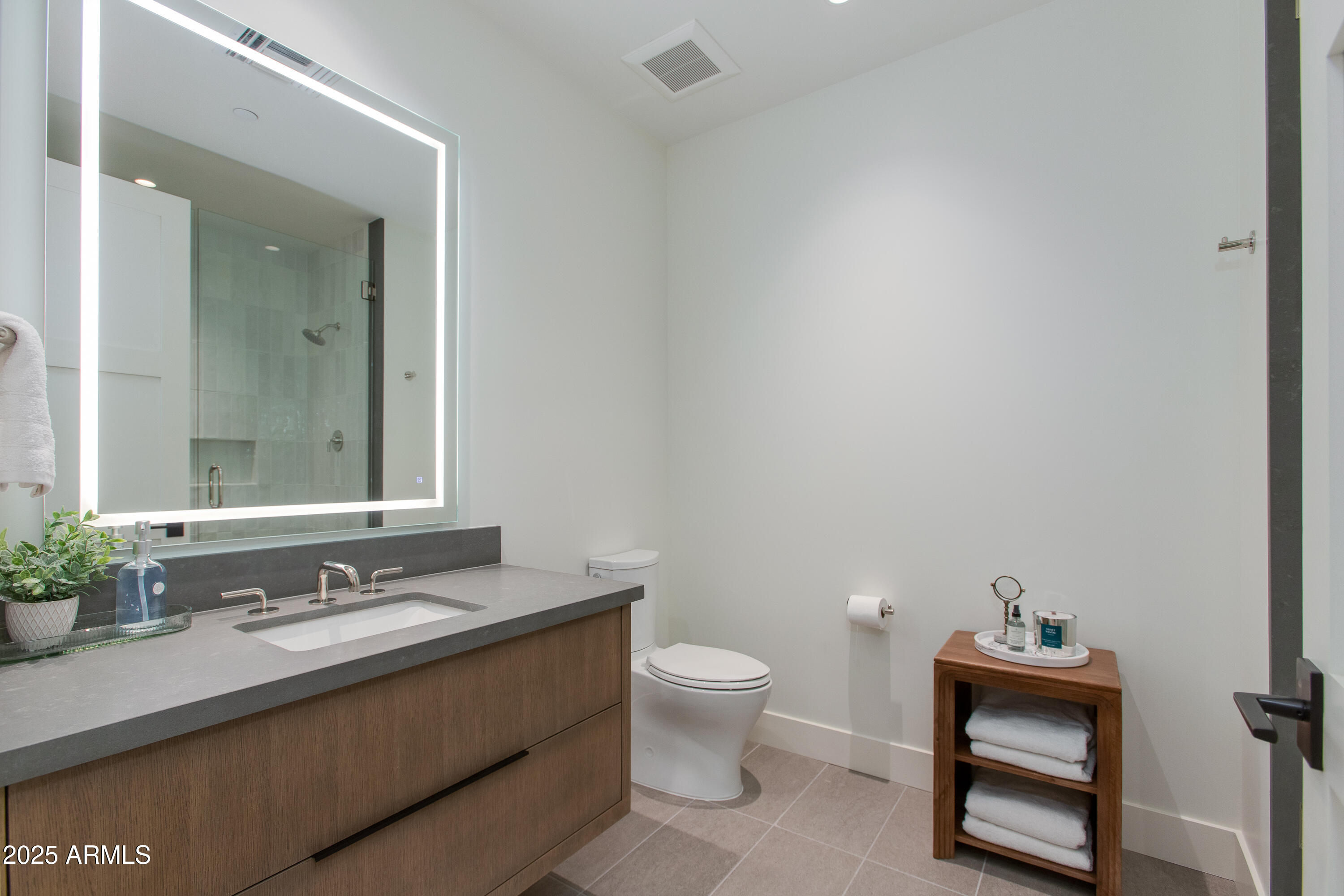 5000 North Camelback Ridge Drive, Unit 206 Scottsdale, AZ 85251 - Photo 22 of 62 a bathroom with a sink vanity and toilet