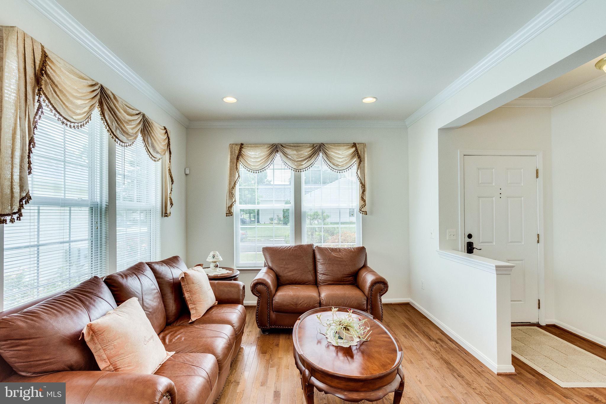 4005 Lunar Eclipse Drive Dumfries, VA 22025 - Photo 4 of 52 Bright and welcoming entry way with sitting room