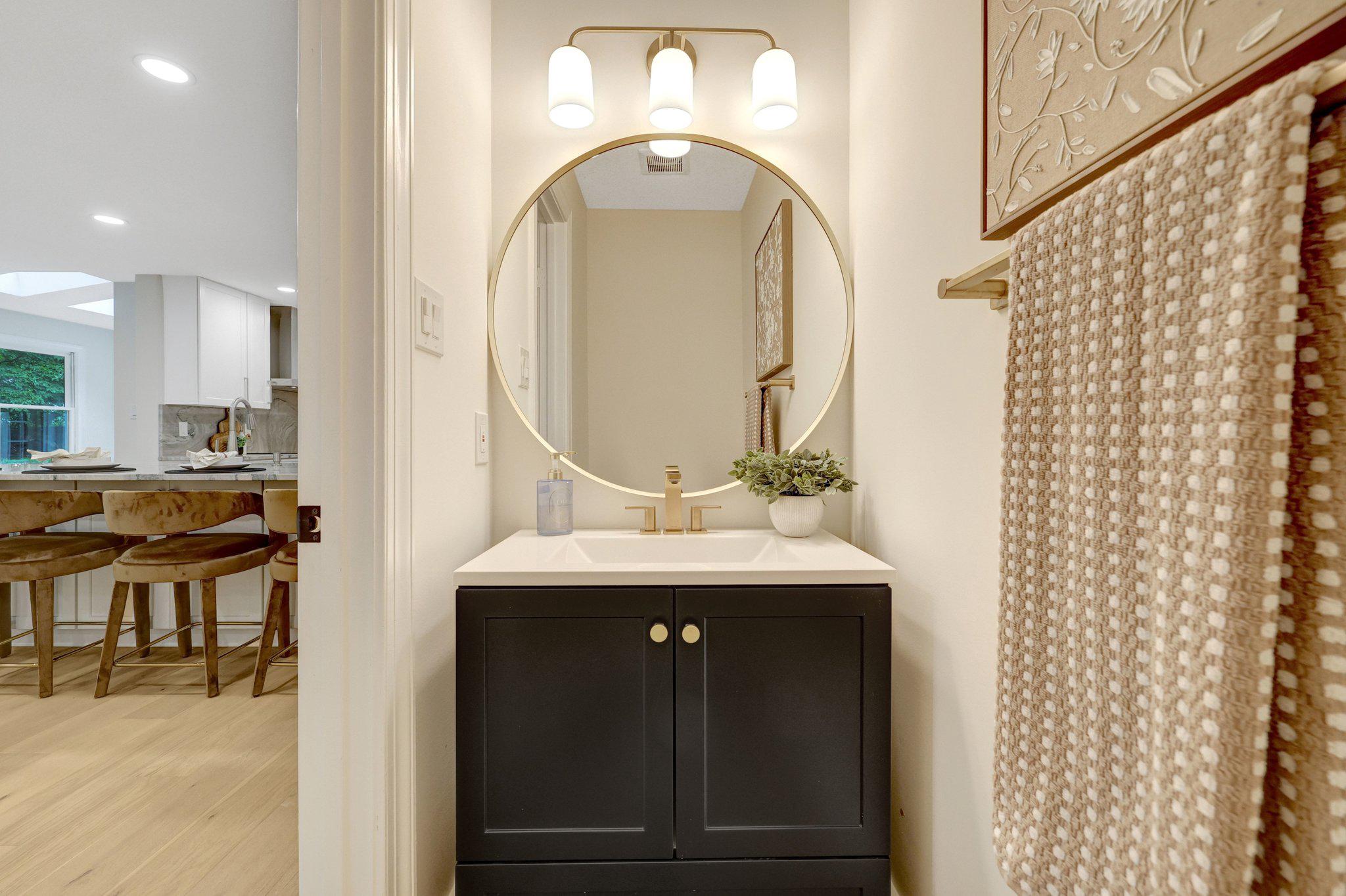 1132 Springvale Road Great Falls, VA 22066 - Photo 28 of 81 Elegant half bath bathroom with modern accents.