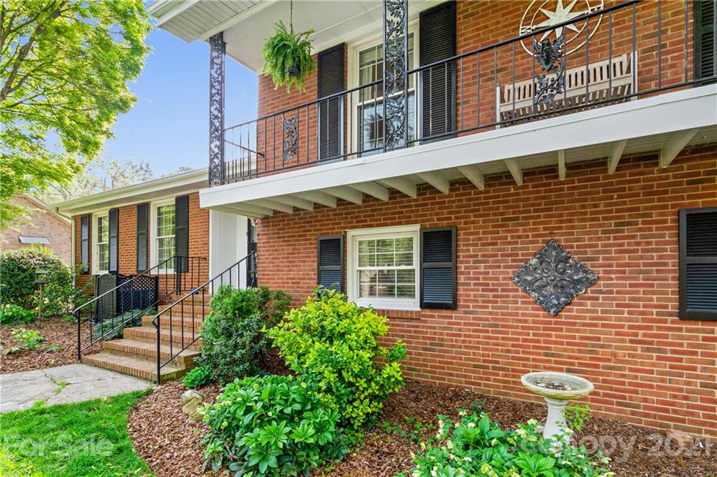 3018 Goneaway Road Charlotte, NC 28210 - Photo 2 of 35 front view of a brick building