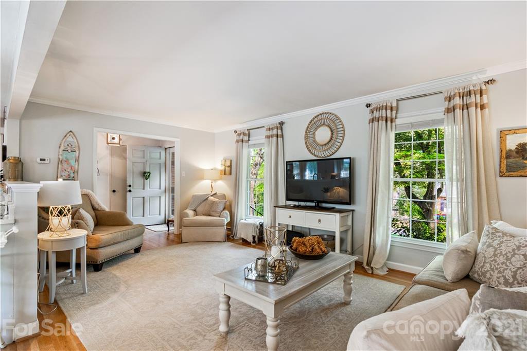 3018 Goneaway Road Charlotte, NC 28210 - Photo 11 of 35 a living room with furniture and a flat screen tv