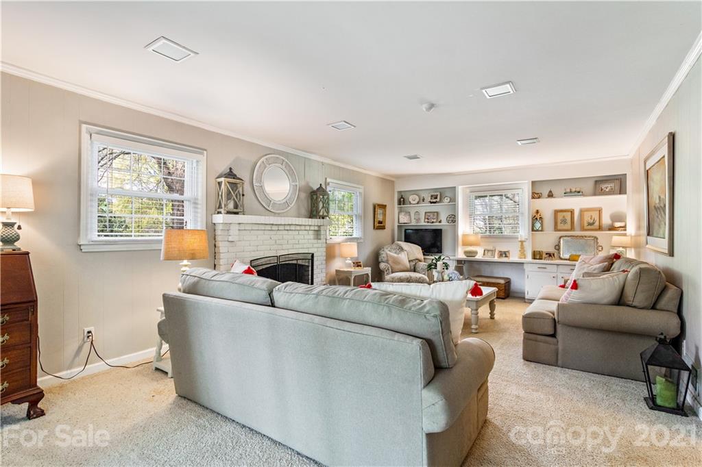 3018 Goneaway Road Charlotte, NC 28210 - Photo 14 of 35 a living room with furniture and a fireplace