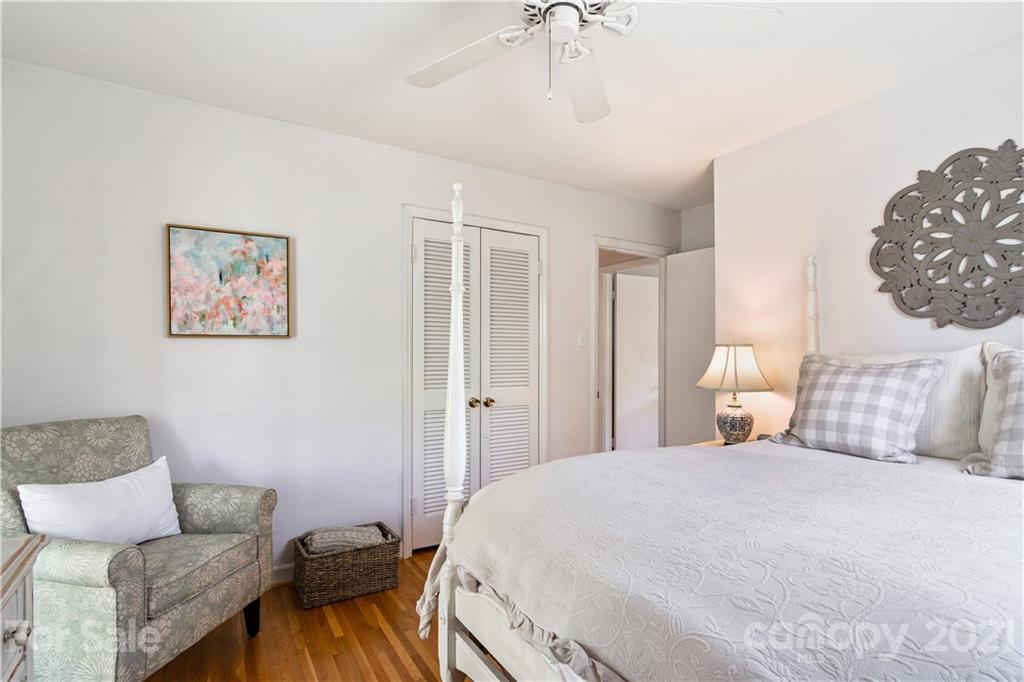 3018 Goneaway Road Charlotte, NC 28210 - Photo 19 of 35 a bedroom with a bed and a couch