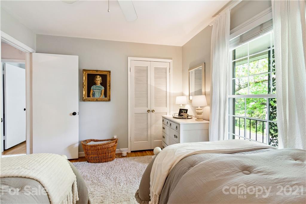 3018 Goneaway Road Charlotte, NC 28210 - Photo 21 of 35 a bedroom with a bed and a window