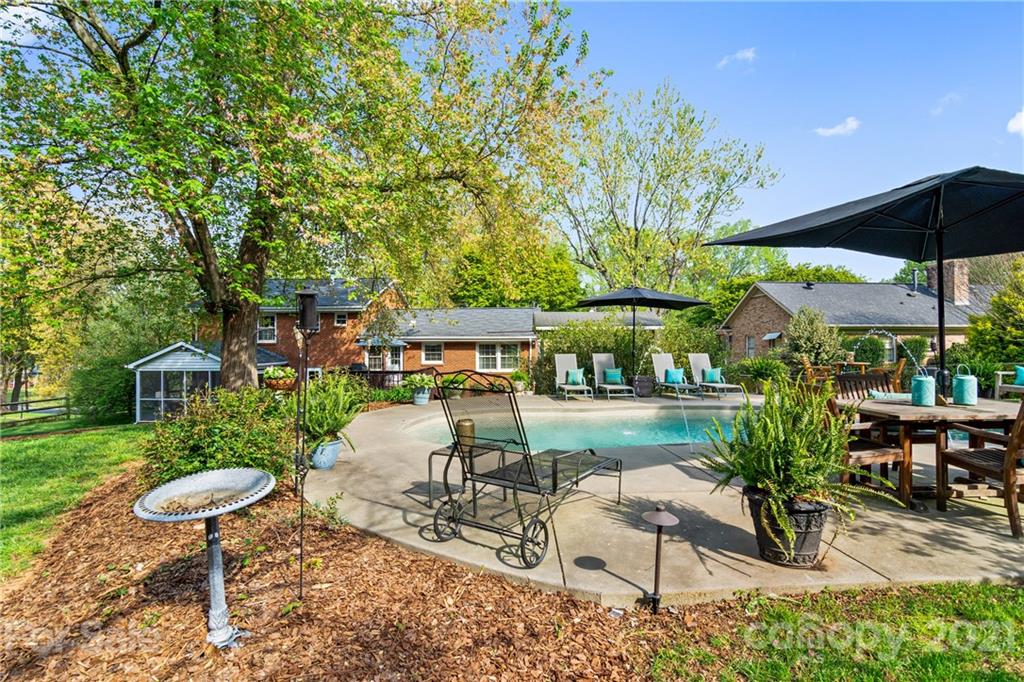 3018 Goneaway Road Charlotte, NC 28210 - Photo 30 of 35 a view of an chairs and table in patio