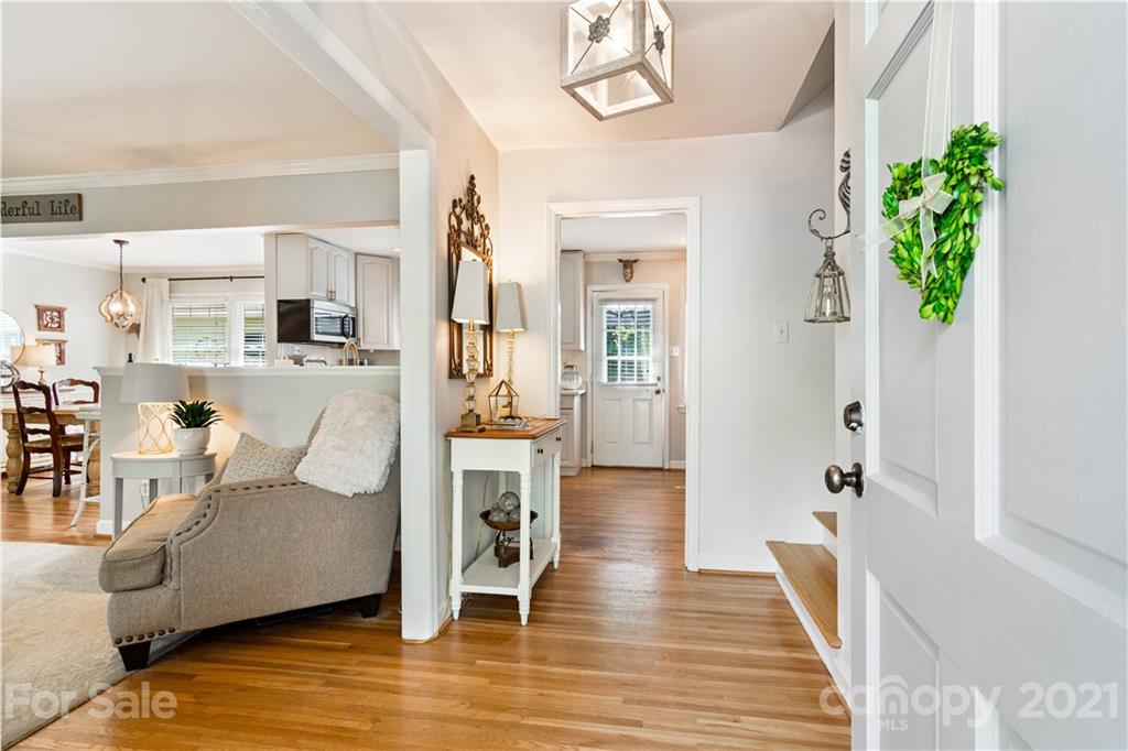3018 Goneaway Road Charlotte, NC 28210 - Photo 4 of 35 a living room with furniture and a wooden floor