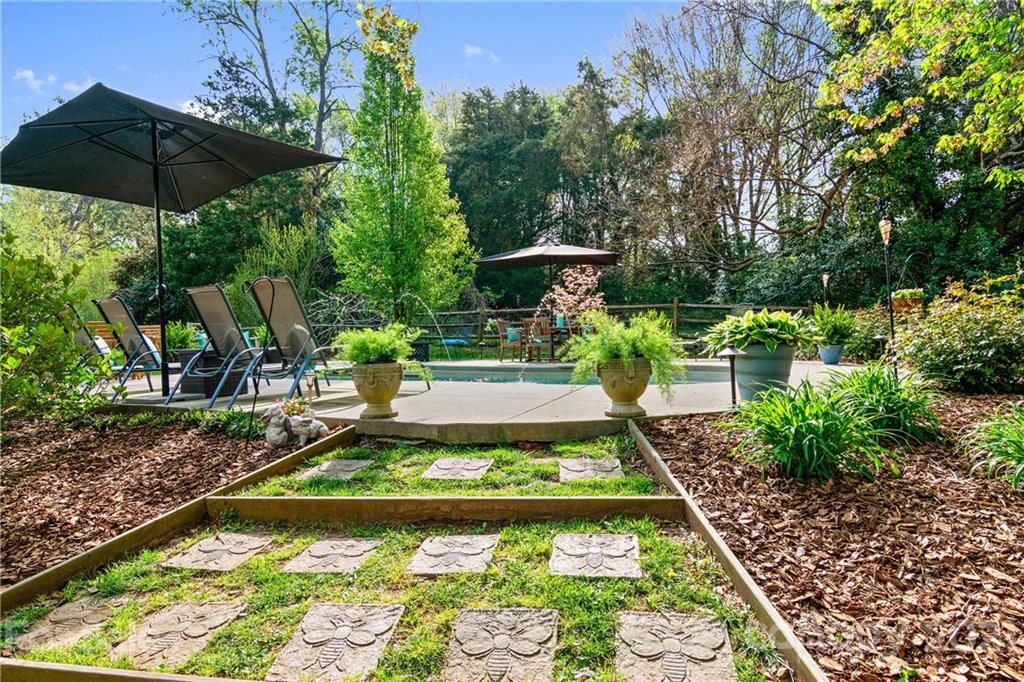 3018 Goneaway Road Charlotte, NC 28210 - Photo 31 of 35 a view of a backyard with sitting area