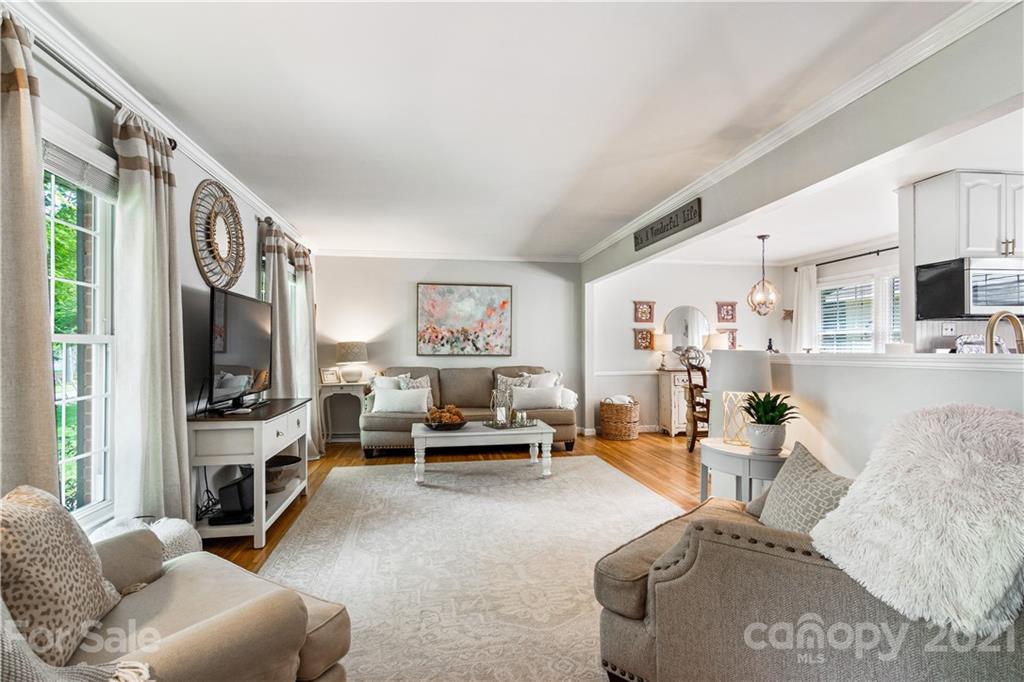 3018 Goneaway Road Charlotte, NC 28210 - Photo 8 of 35 a living room with furniture and a flat screen tv