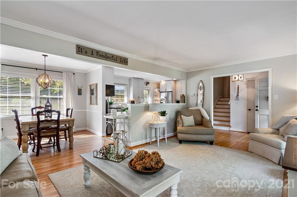 3018 Goneaway Road Charlotte, NC 28210 - Photo 10 of 35 a living room with furniture and wooden floor