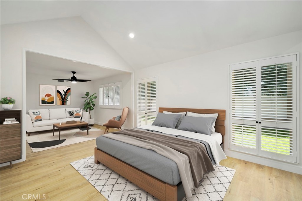 5408 Hanover Drive Cypress, CA 90630 - Photo 15 of 33 a spacious bedroom with a large bed and a window