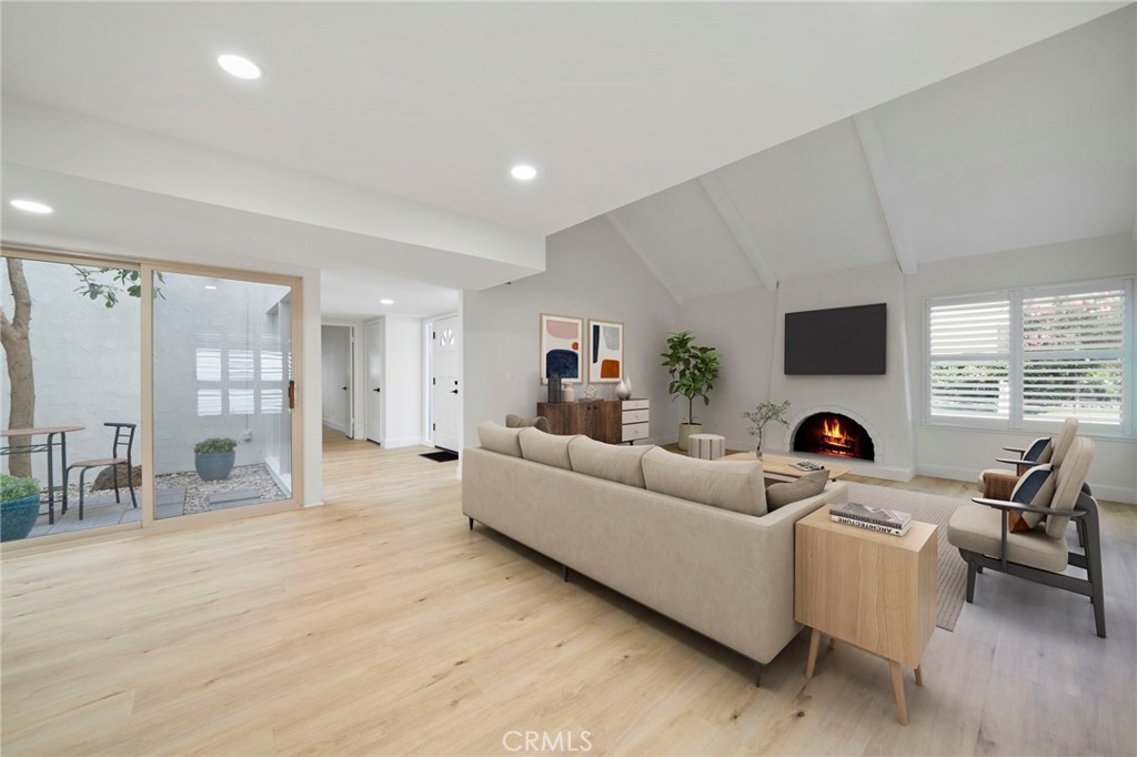 5408 Hanover Drive Cypress, CA 90630 - Photo 2 of 33 a living room with furniture and a flat screen tv