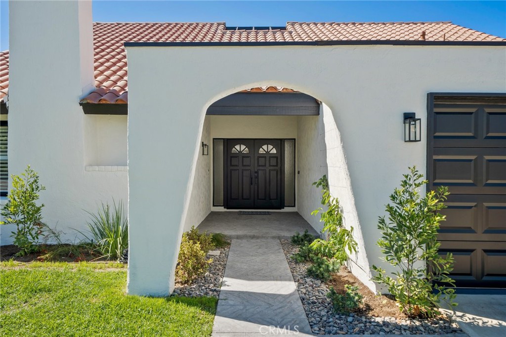 5408 Hanover Drive Cypress, CA 90630 - Photo 4 of 33 a front view of a house with garden