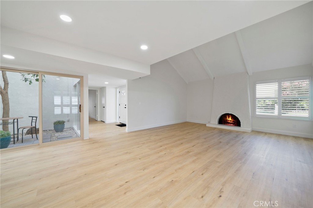 5408 Hanover Drive Cypress, CA 90630 - Photo 5 of 33 an empty room with kitchen view and windows
