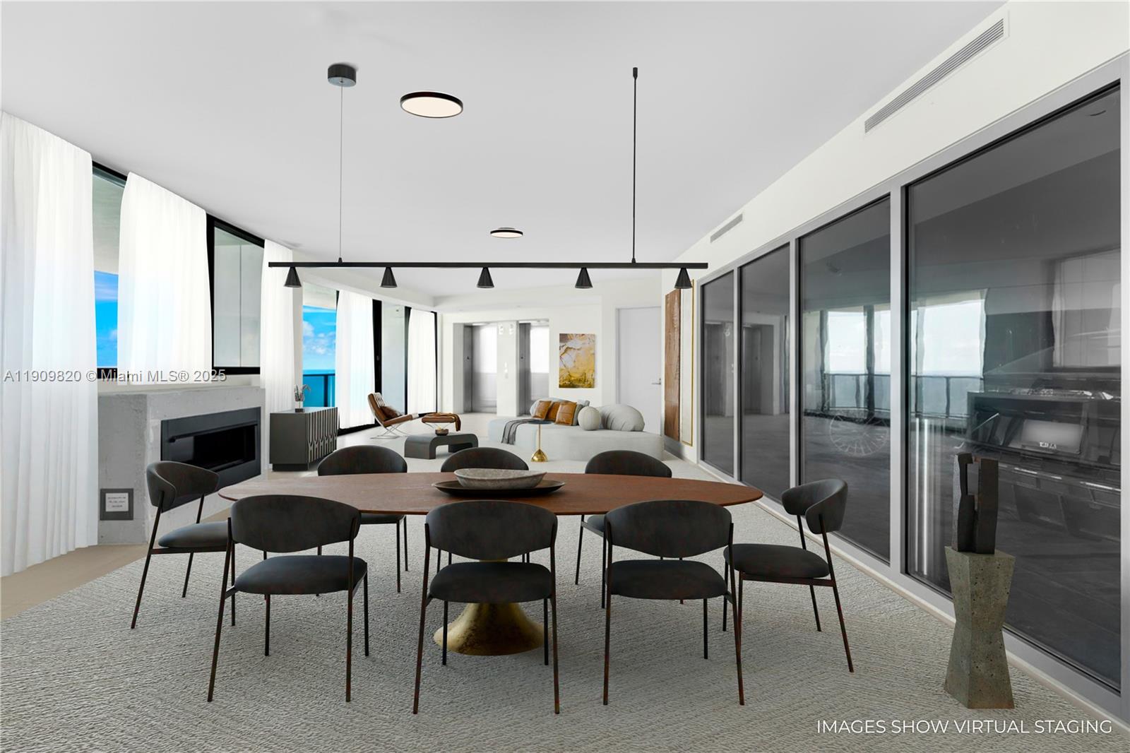 18555 Collins Avenue, Unit 3205 Sunny Isles Beach, FL 33160 - Photo 2 of 50 a view of a dining room with furniture